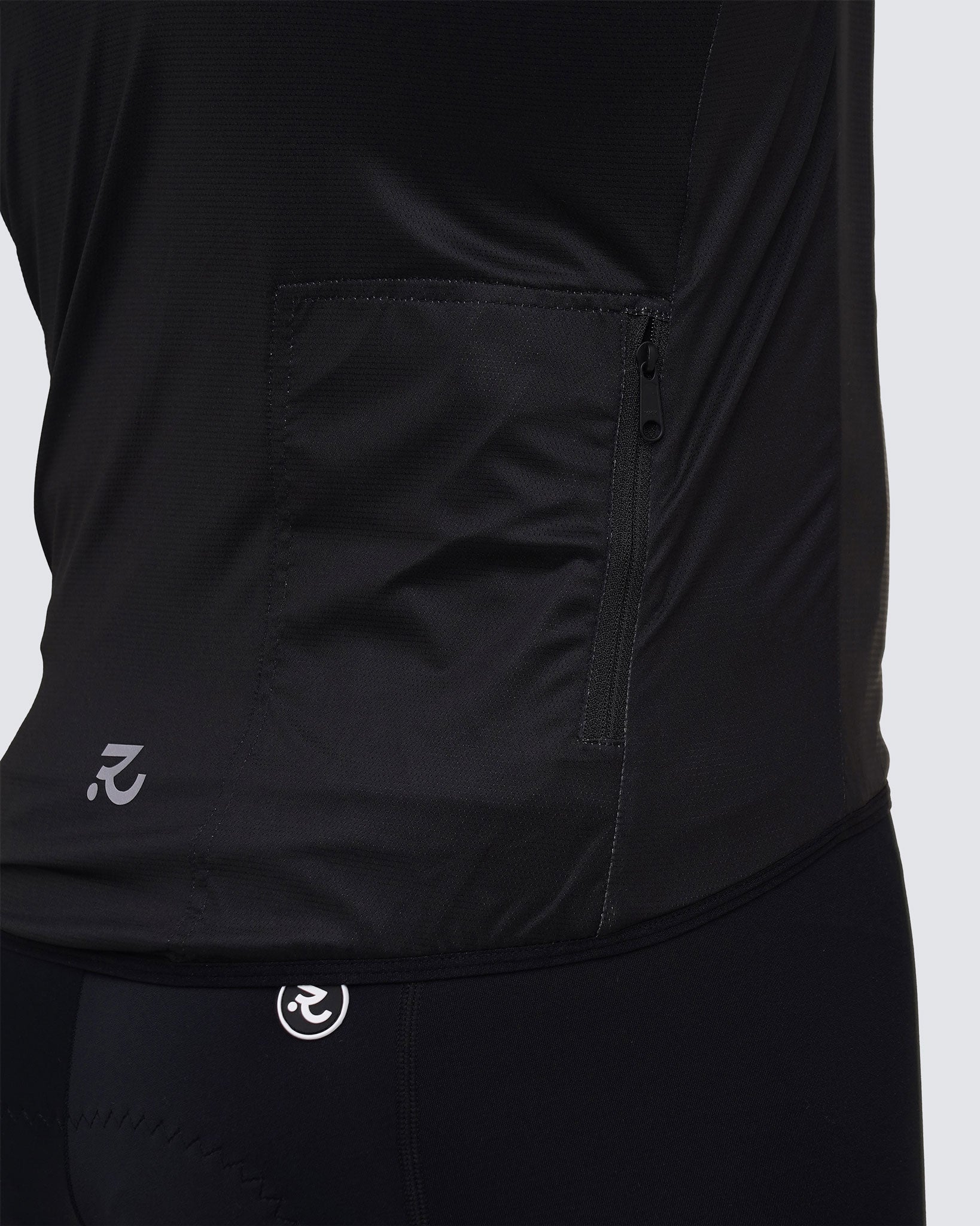 Racing black cycling vest men safety pocket close up