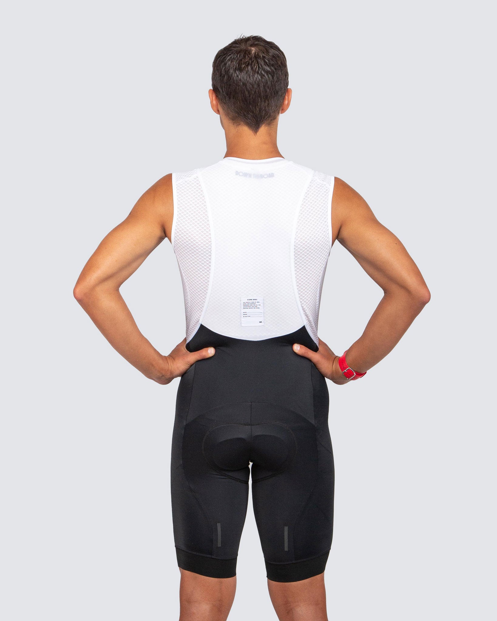 black bibs and white laces from the back view