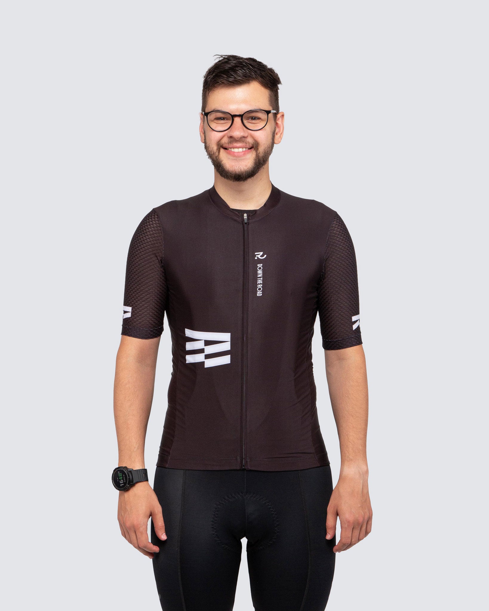 front man wearing all black cycling kit