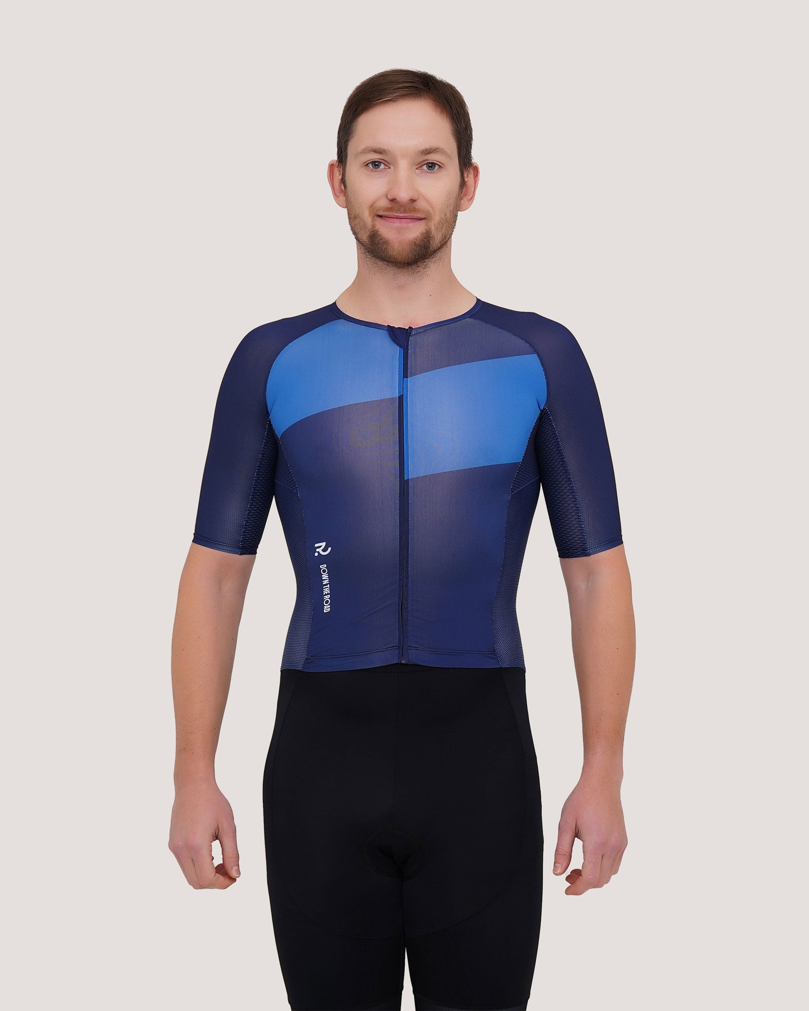 man wearing a blue shorts sleeve trisuit