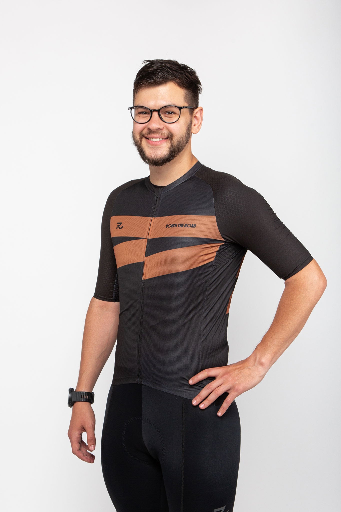 man wearing black cycling breakway jersey