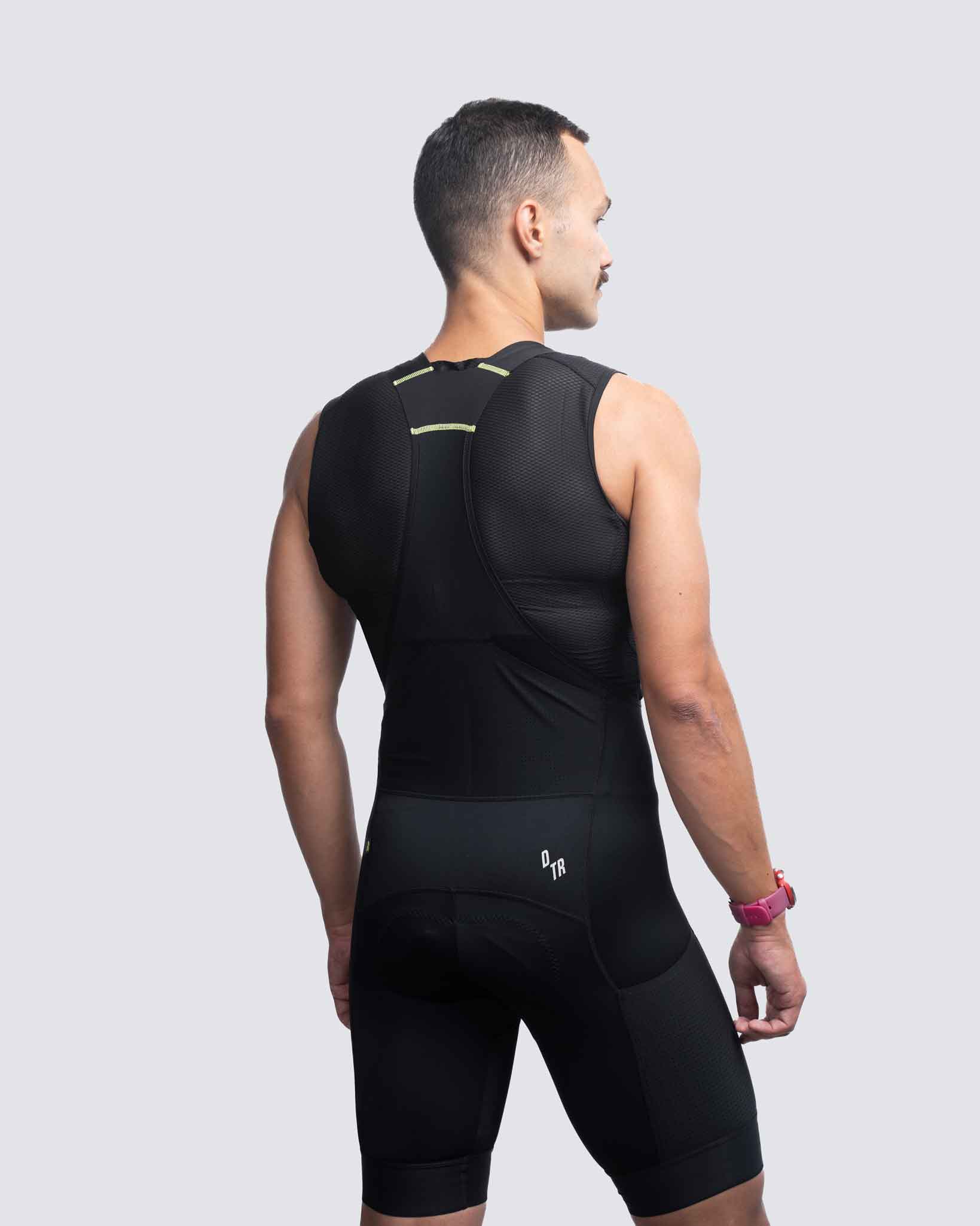 back side view man black cargo bibs