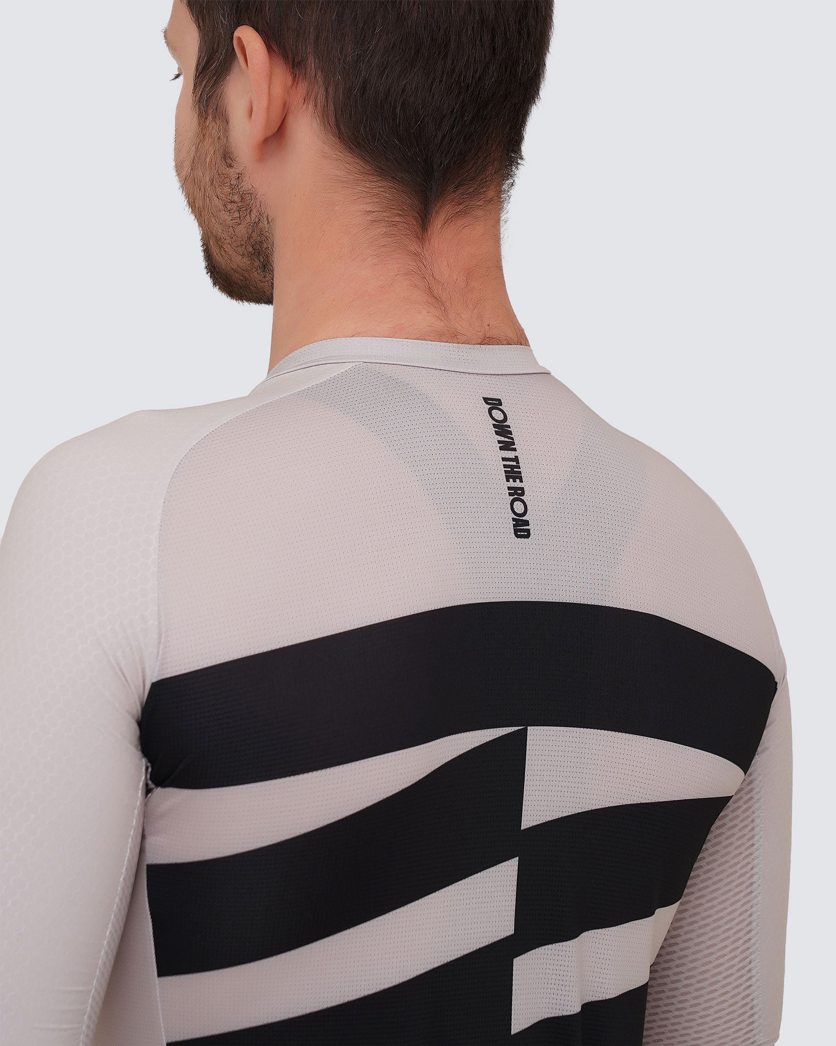 back close up of man breakaway cycling jersey beige
