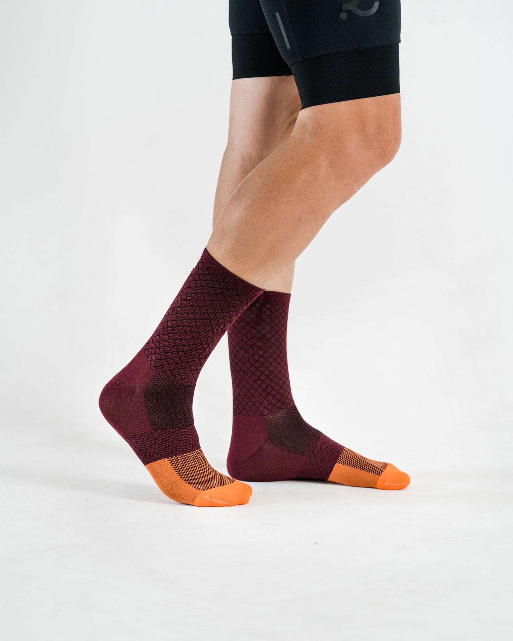 side view of purple cycling socks