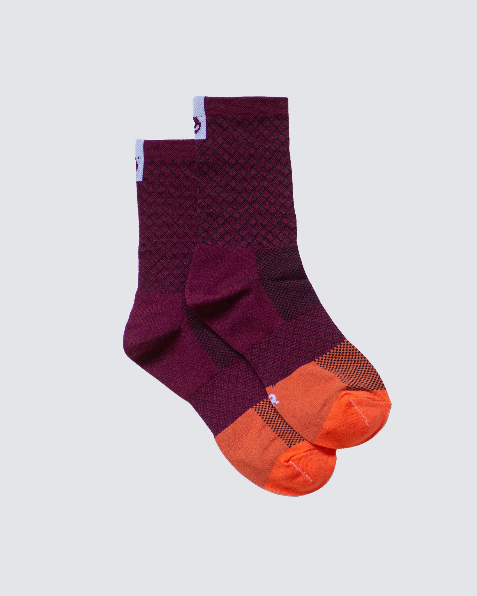 purple socks against white background