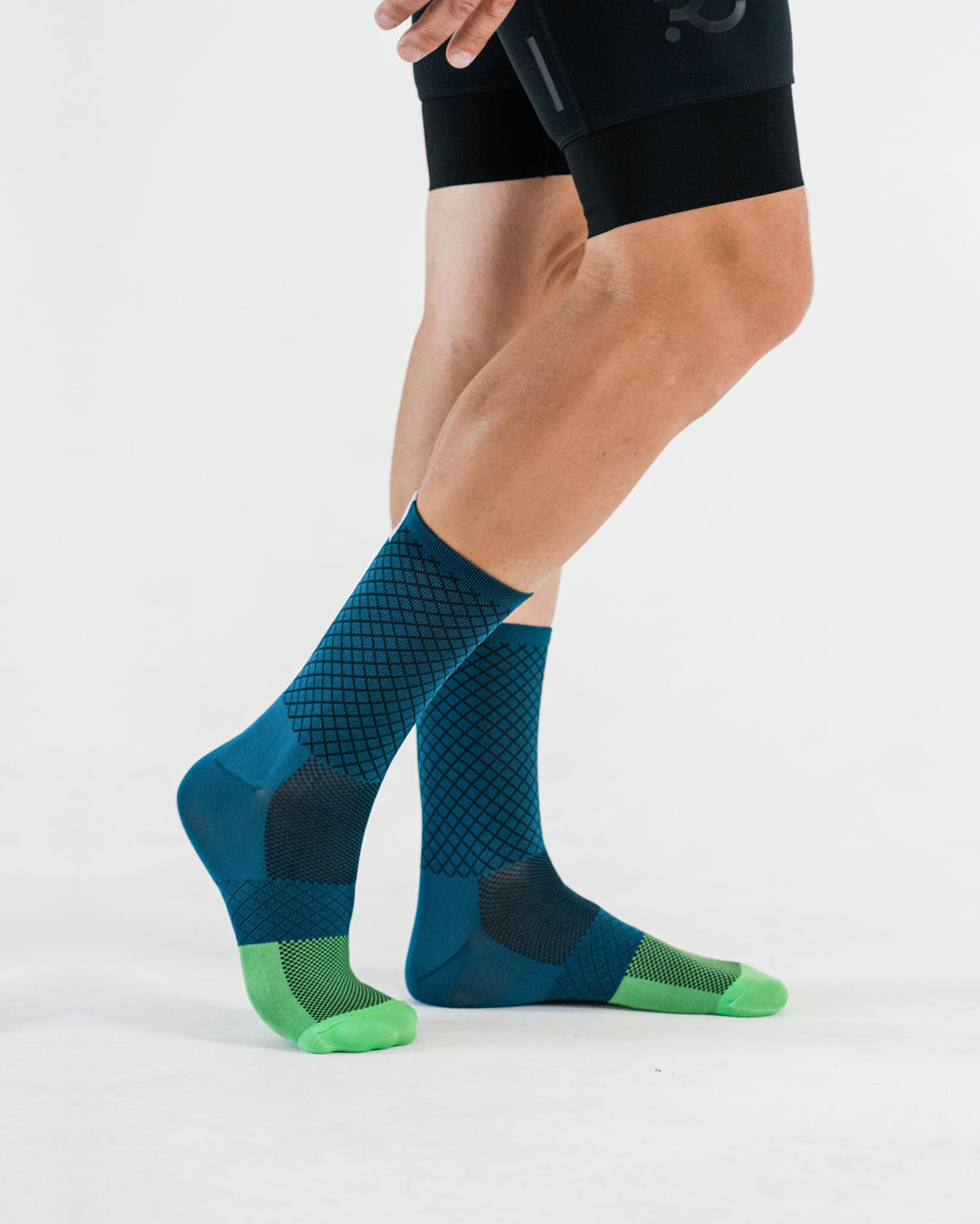 side view of blue cycling socks
