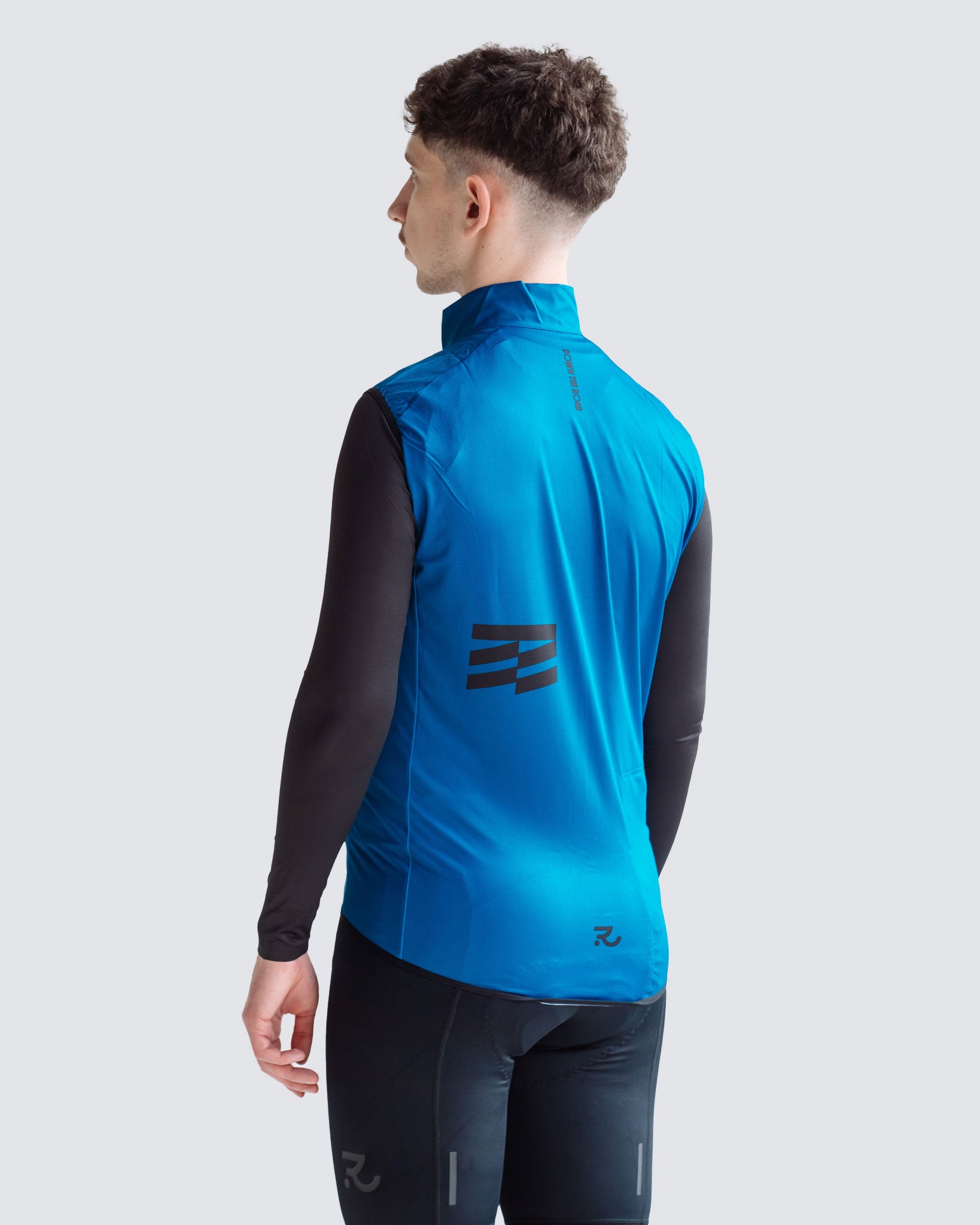 Wavy teal men cycling vest back side view