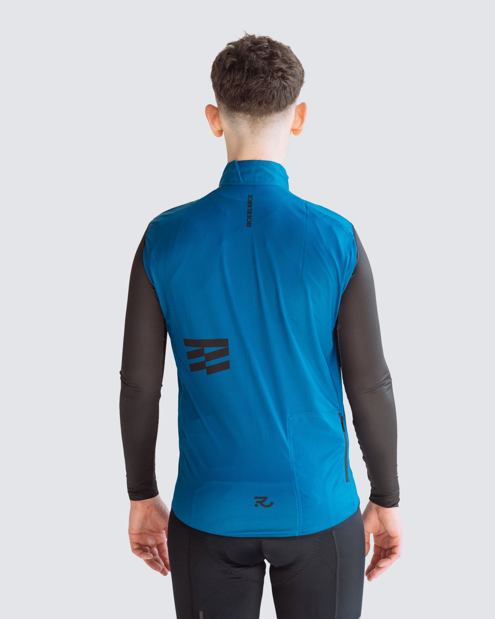Wavy teal men cycling vest back view