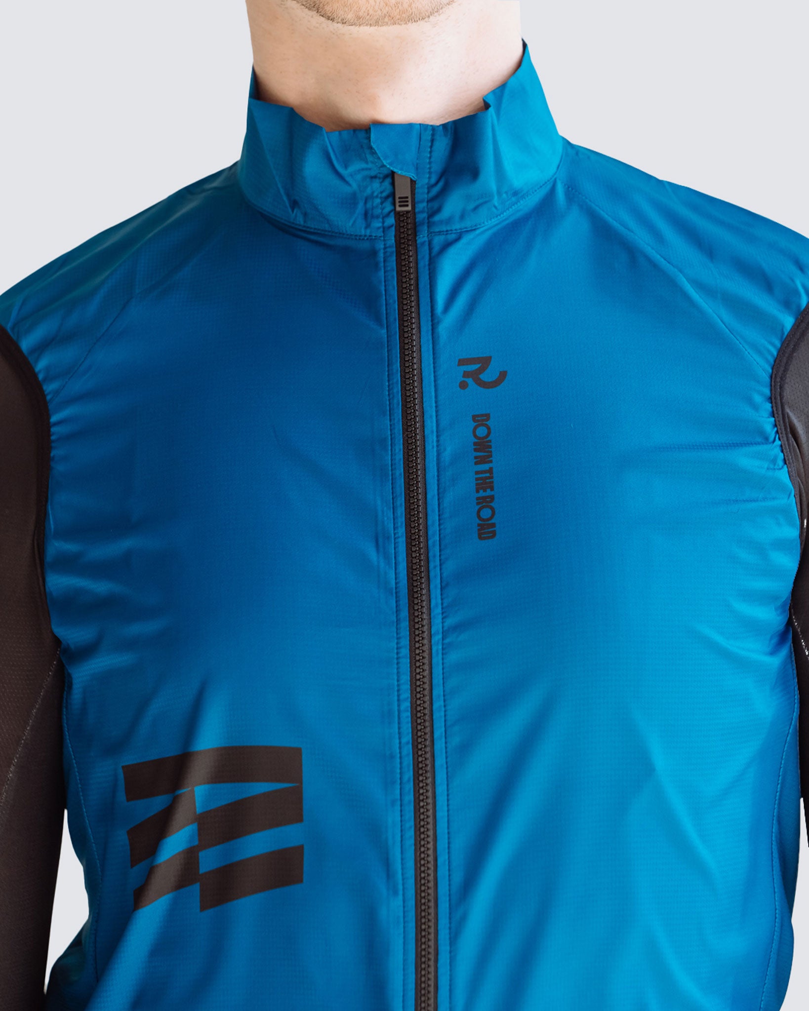 Wavy teal men cycling vest front close up two ways zipper