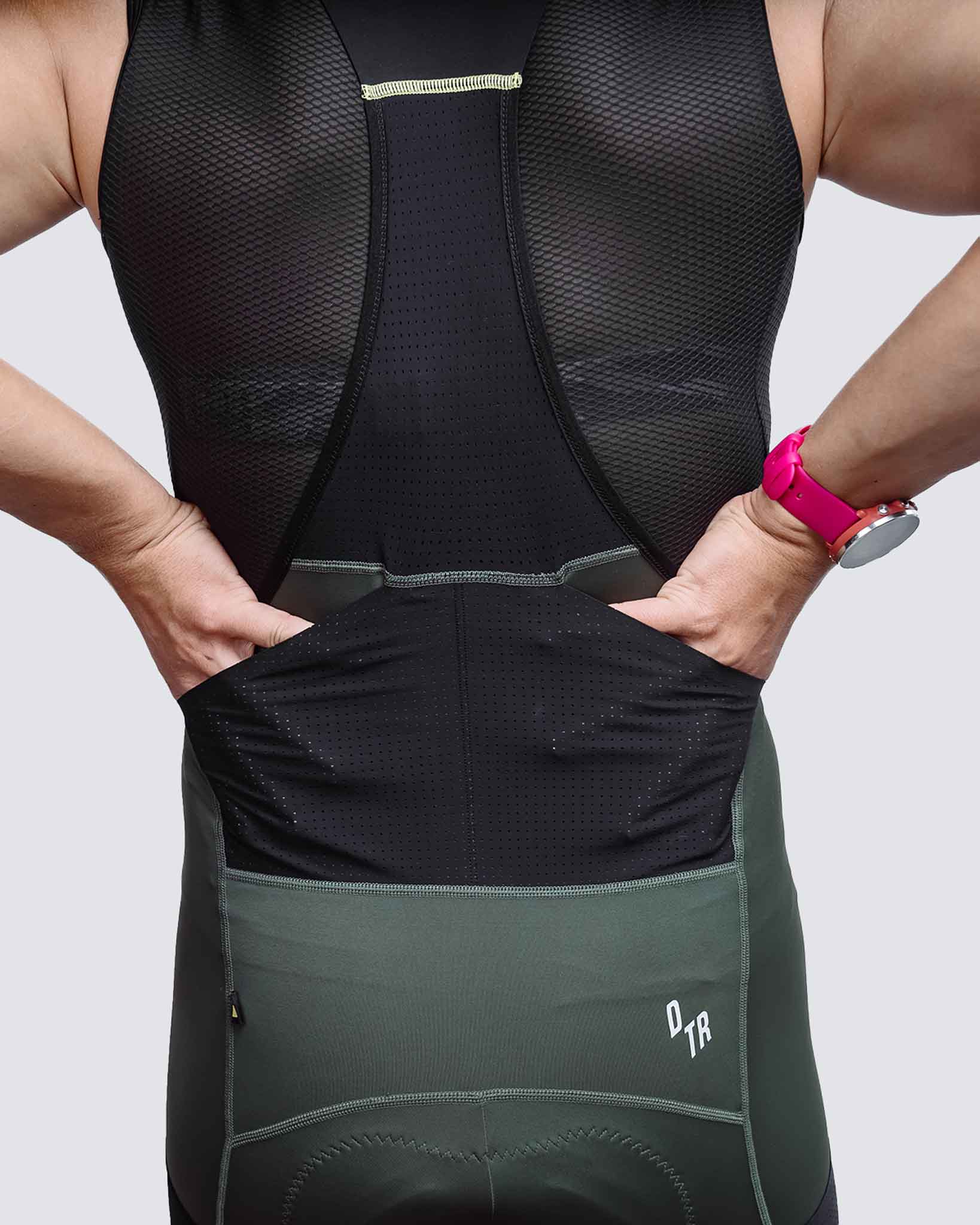 back pockets on man green cargo bibs for cycling