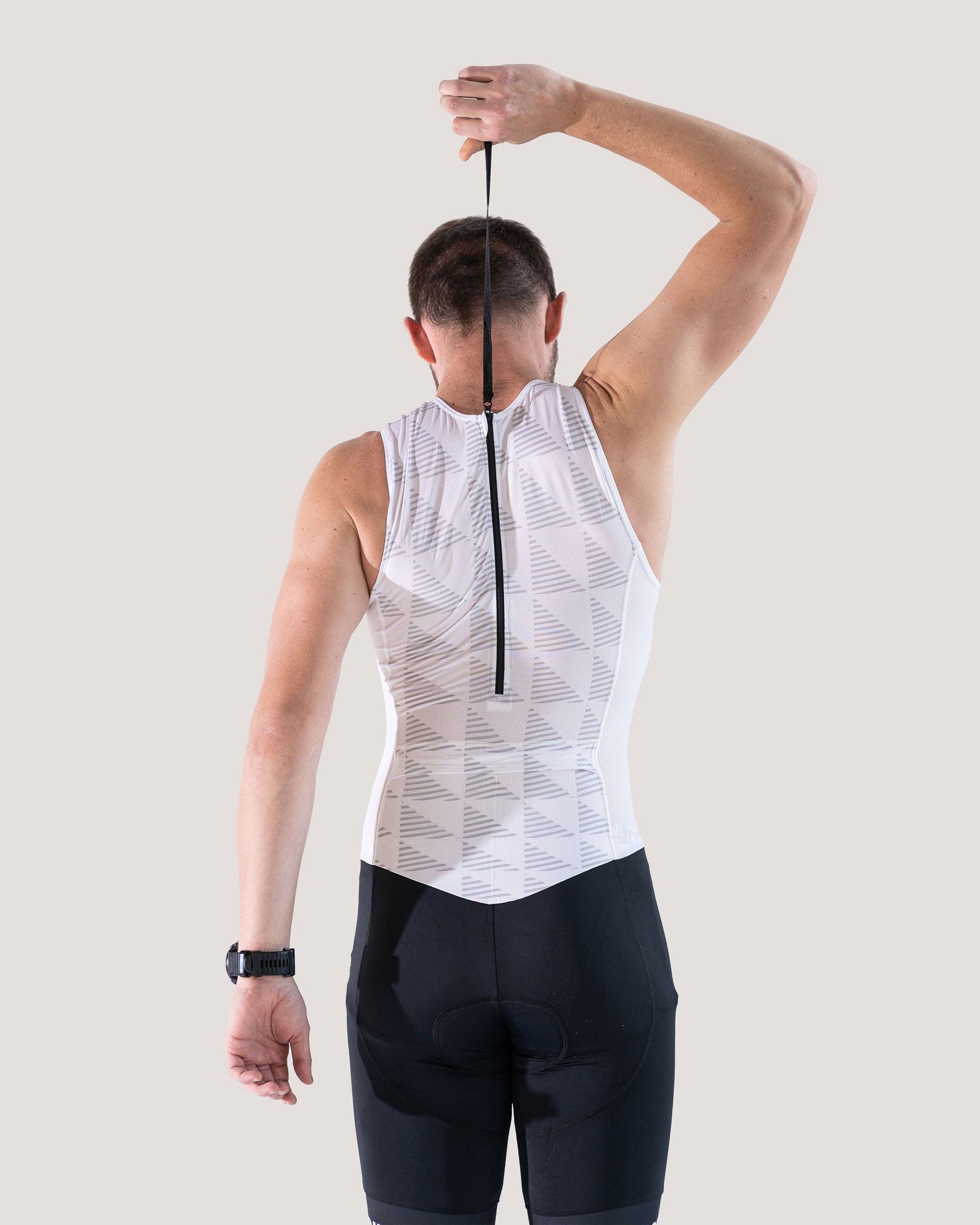 back of white sleevless trisuit with rear zipper