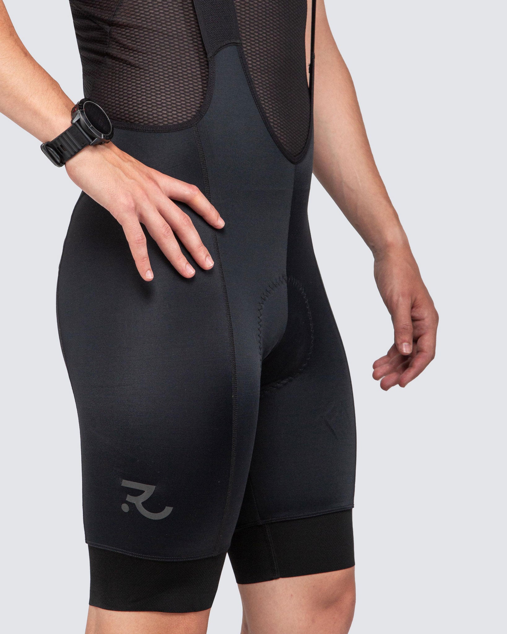 black bibs with black base layer and garmin watch