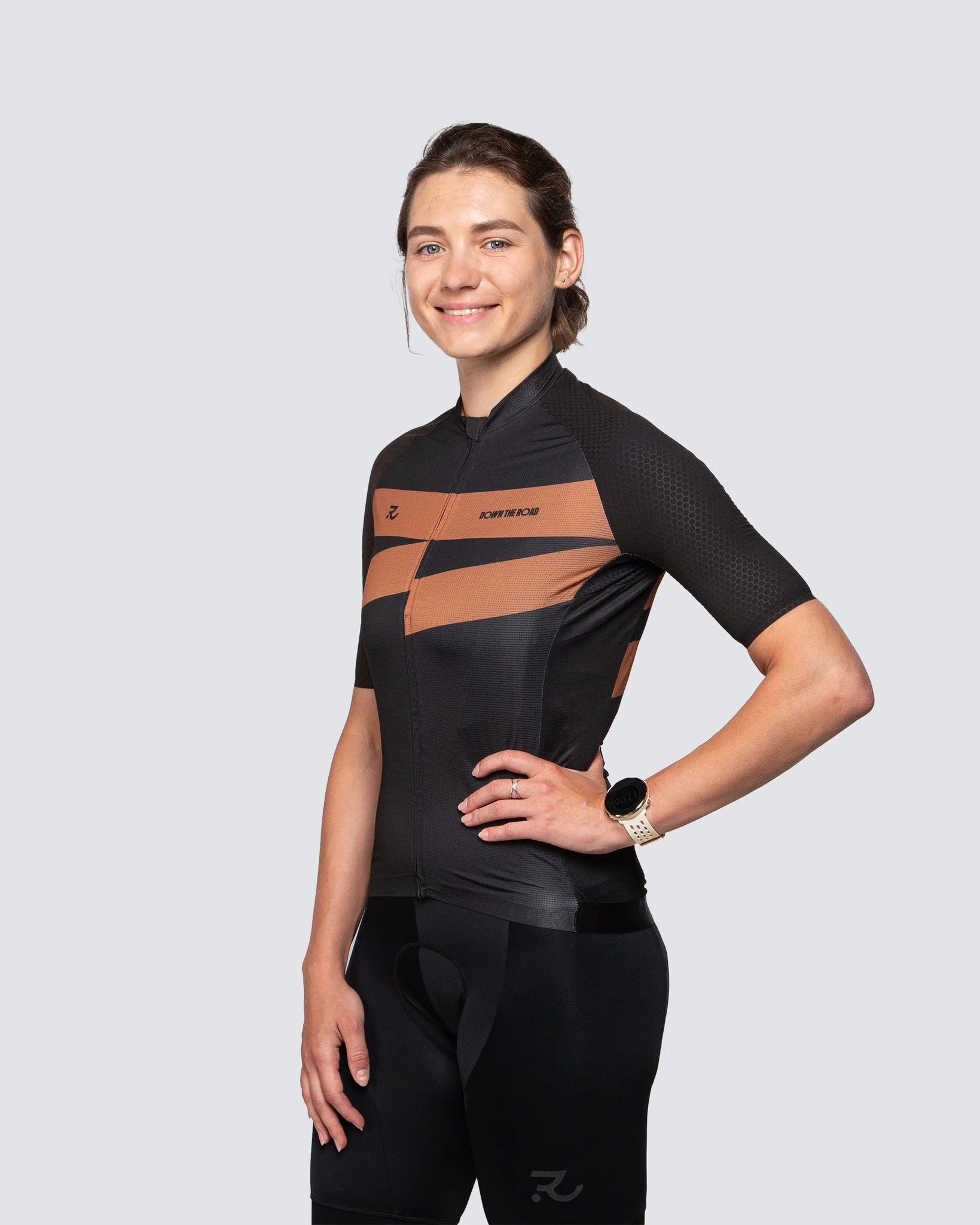 woman wearing black cycling kit