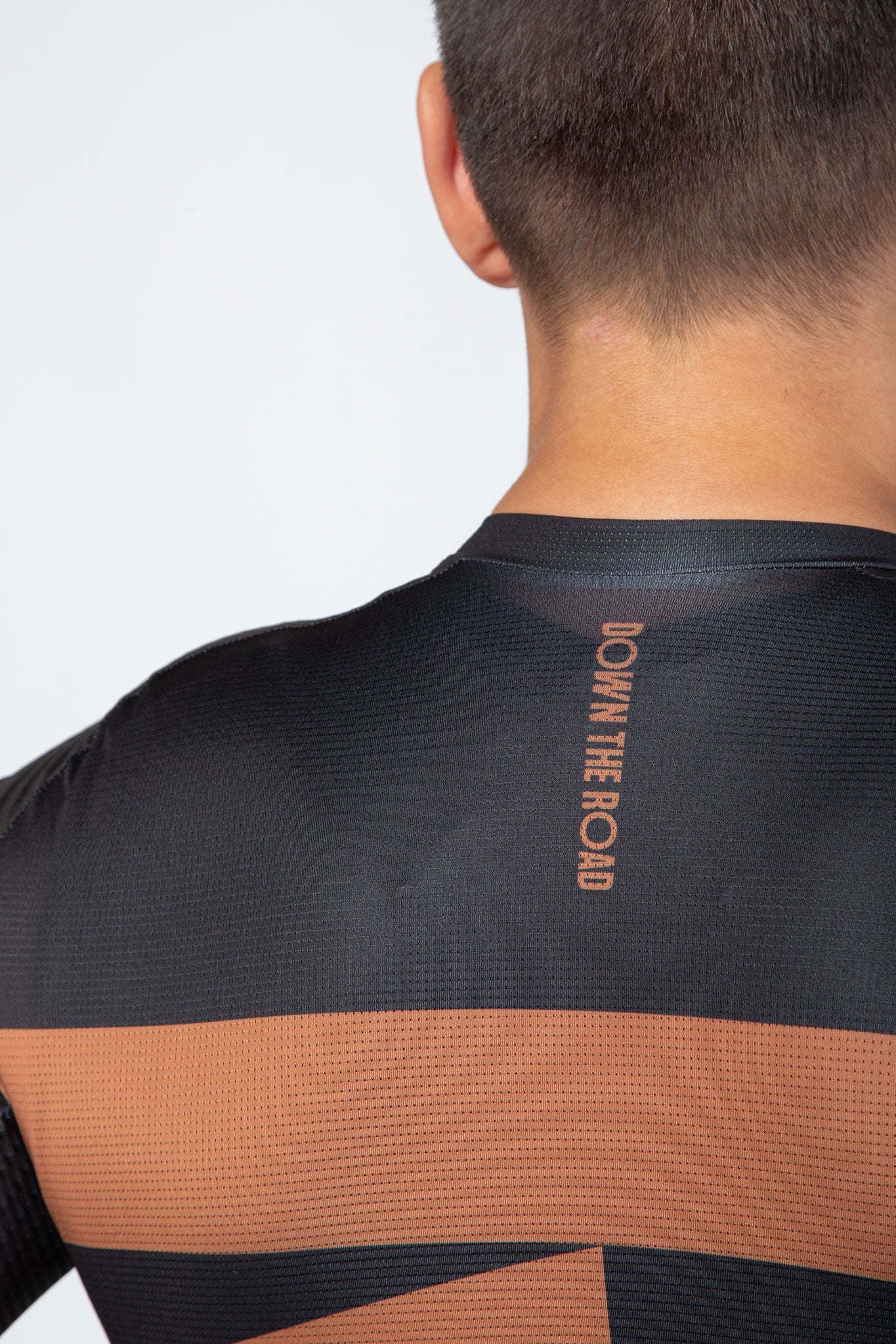 close up of black cycling breakway jersey 