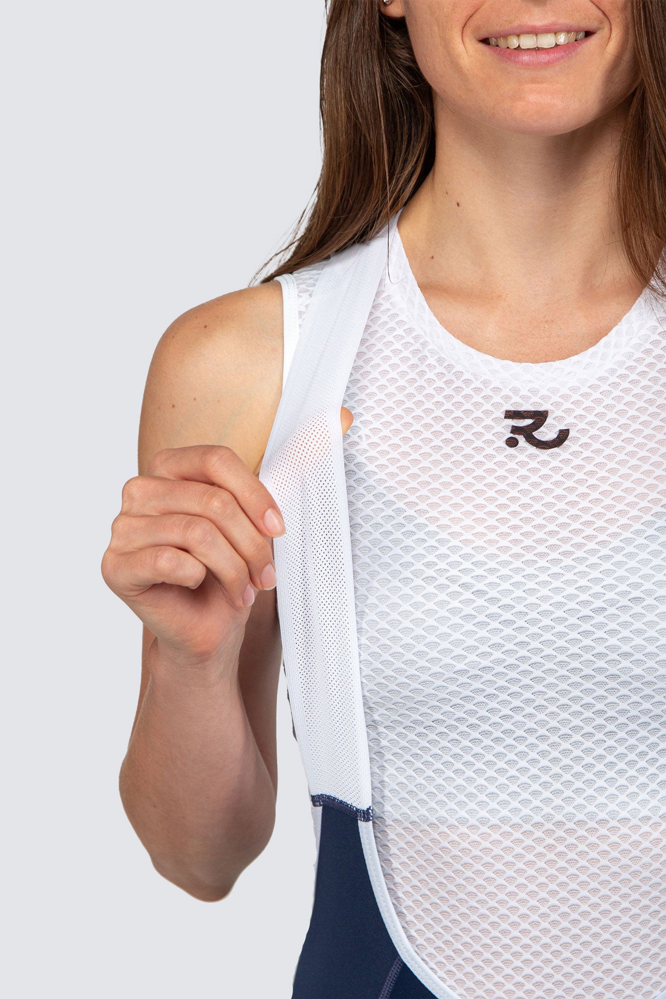 close up of bib laces and white base layer