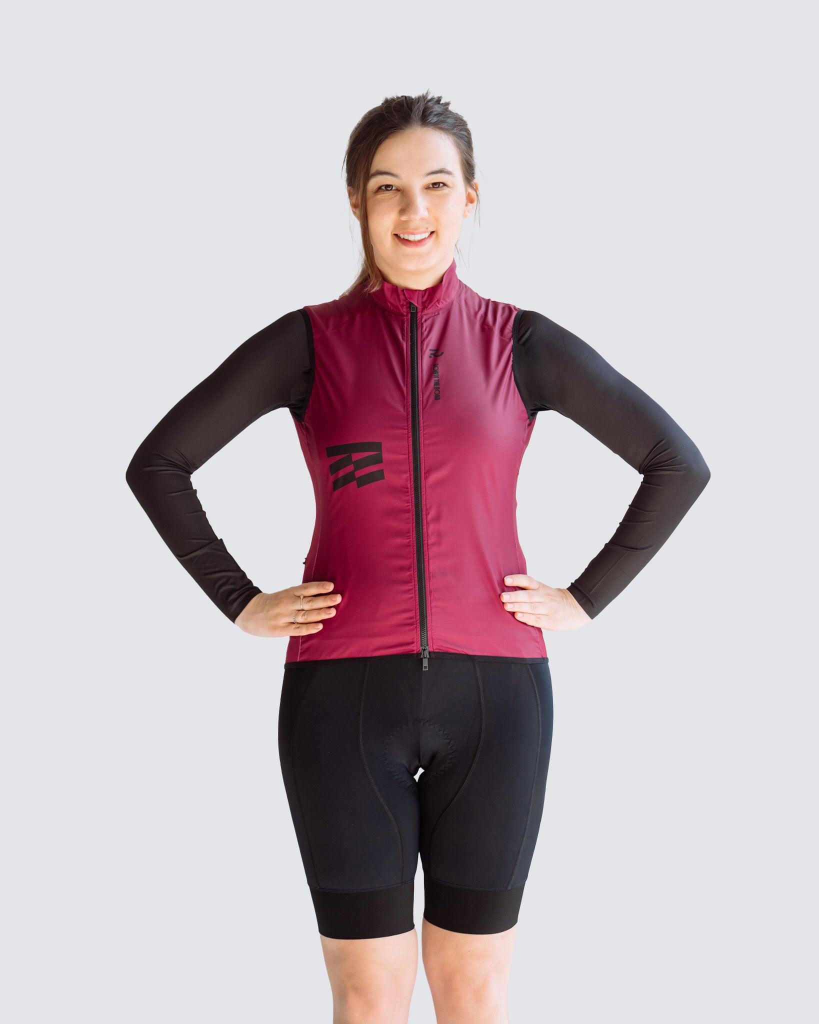 front view of woman italian plum cycling vest