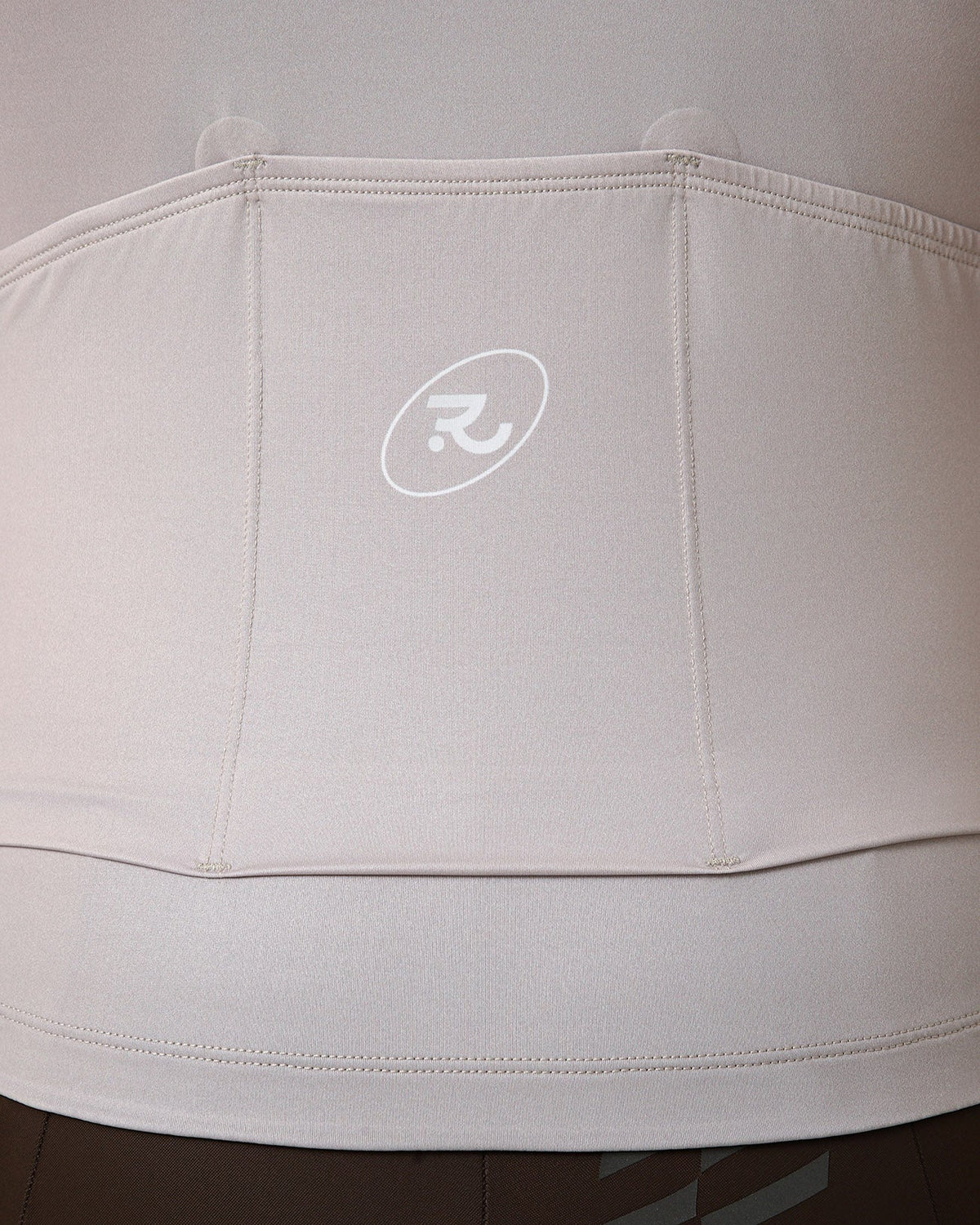 Women's Motion cycling jersey in Dune Brown, rear pockets