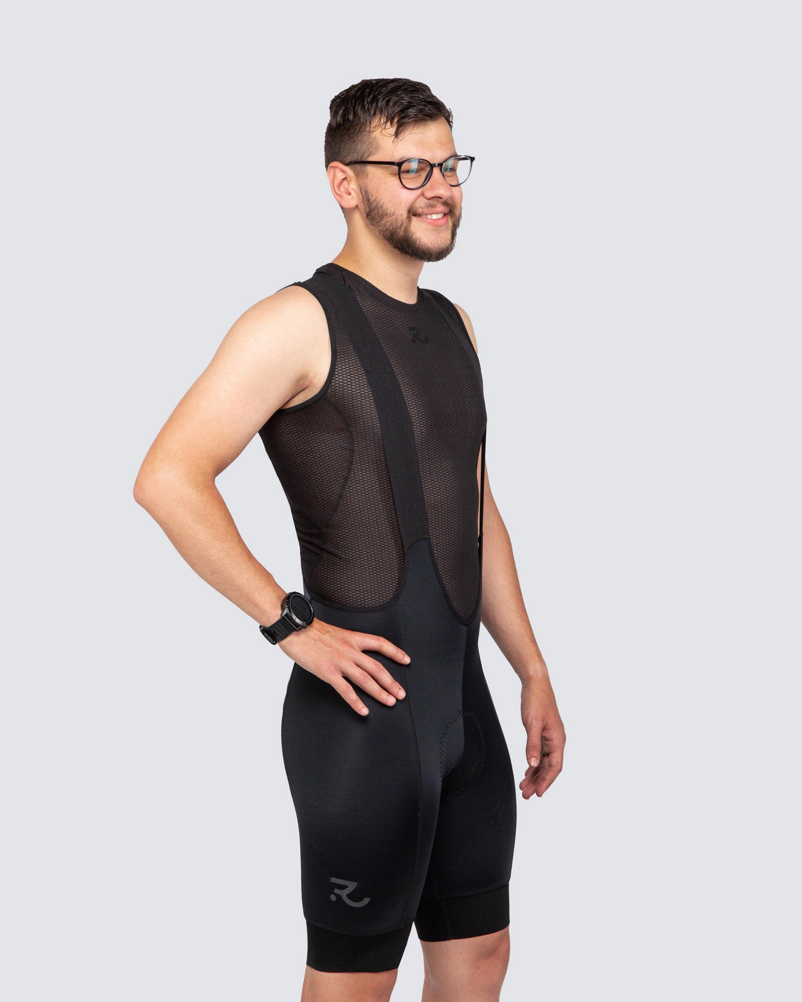 man wearing all black cycling kit