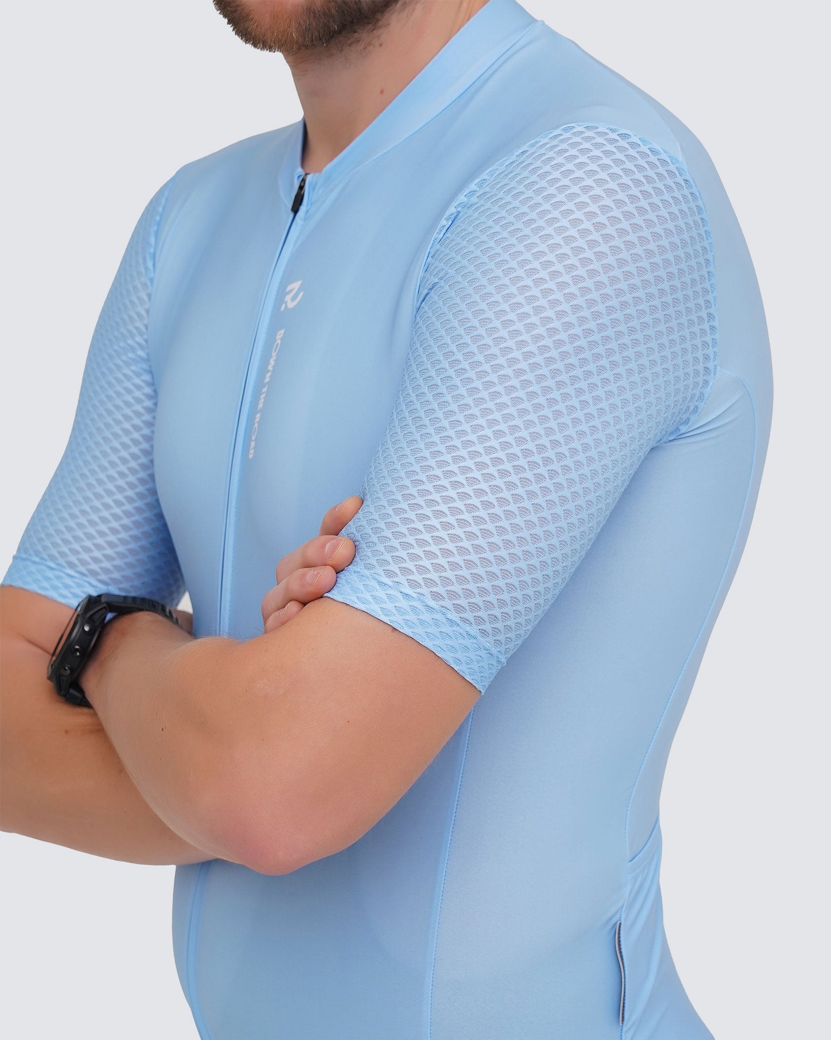 nature blue cycling jersey mesh sleeve close up