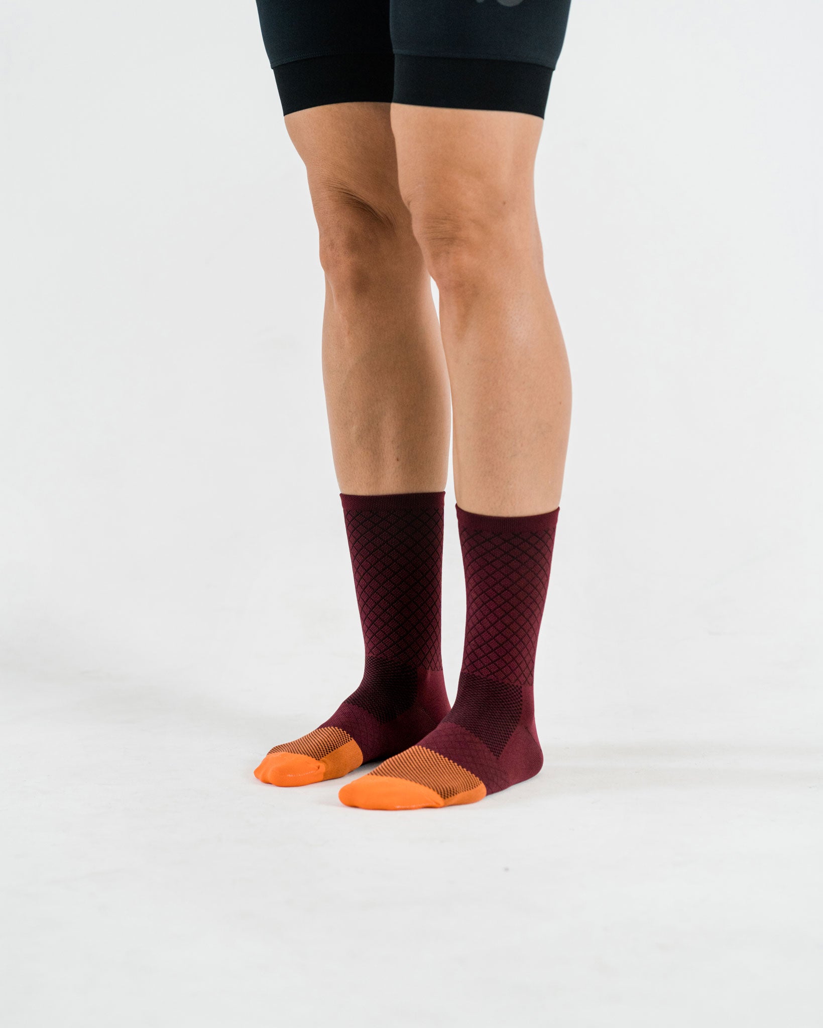 purple cycling socks with orange toebox