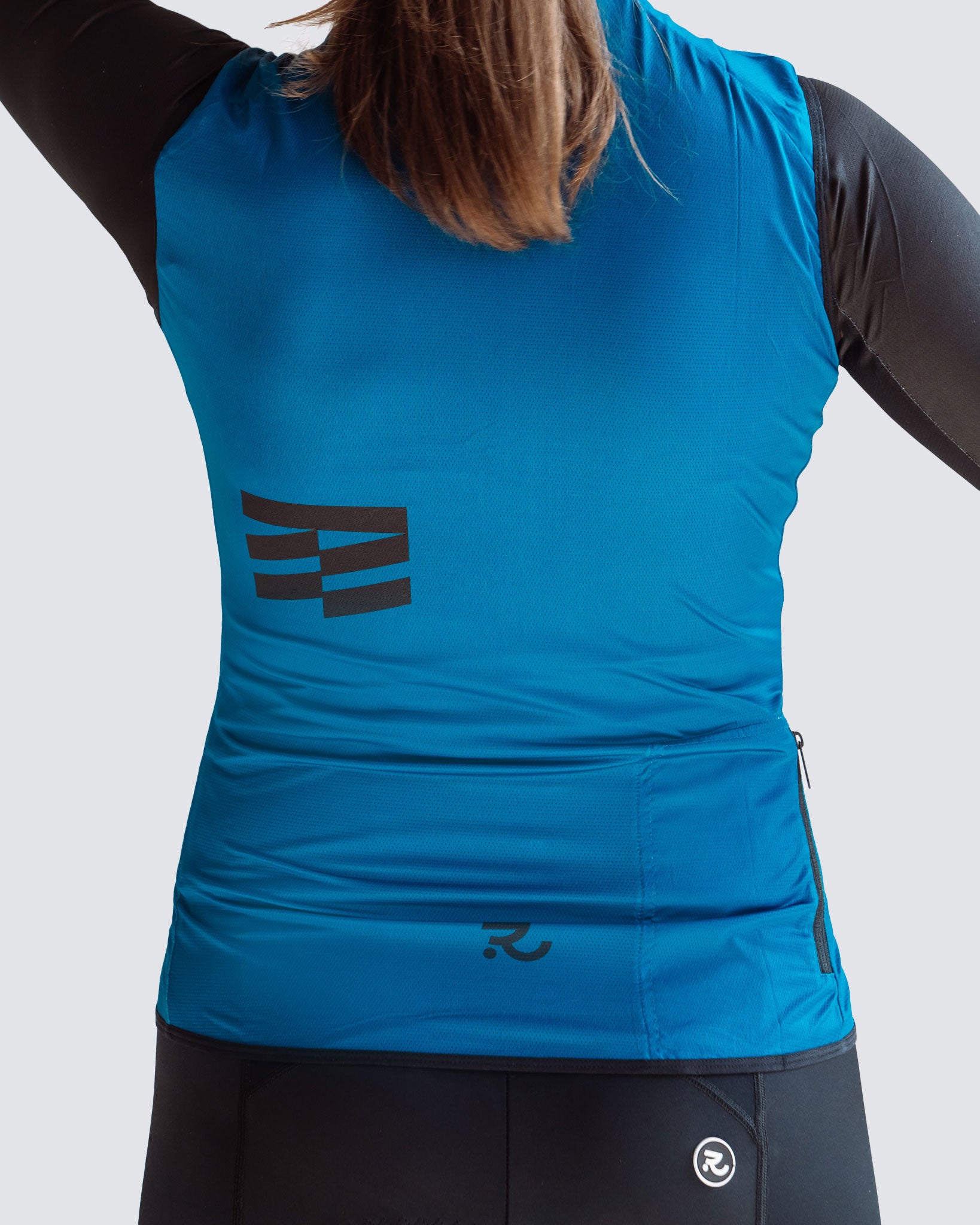 back view fo wavy teal cycling vest
