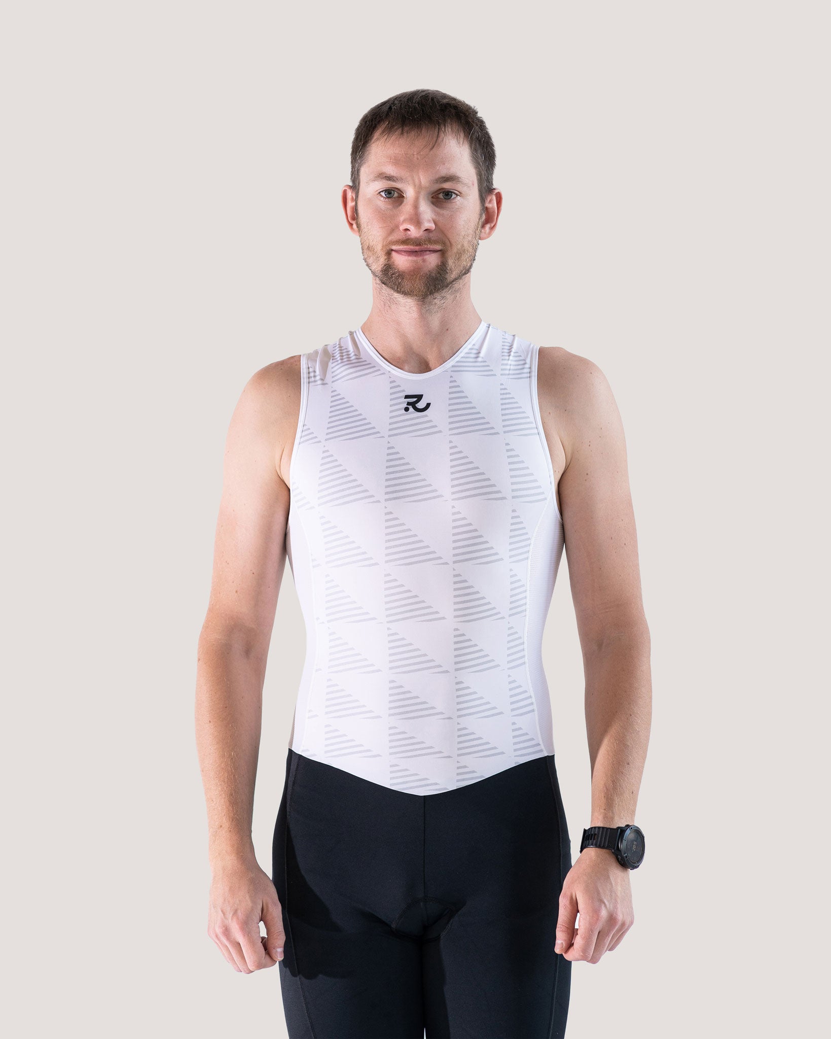 man wearing a white sleeveless trisuit