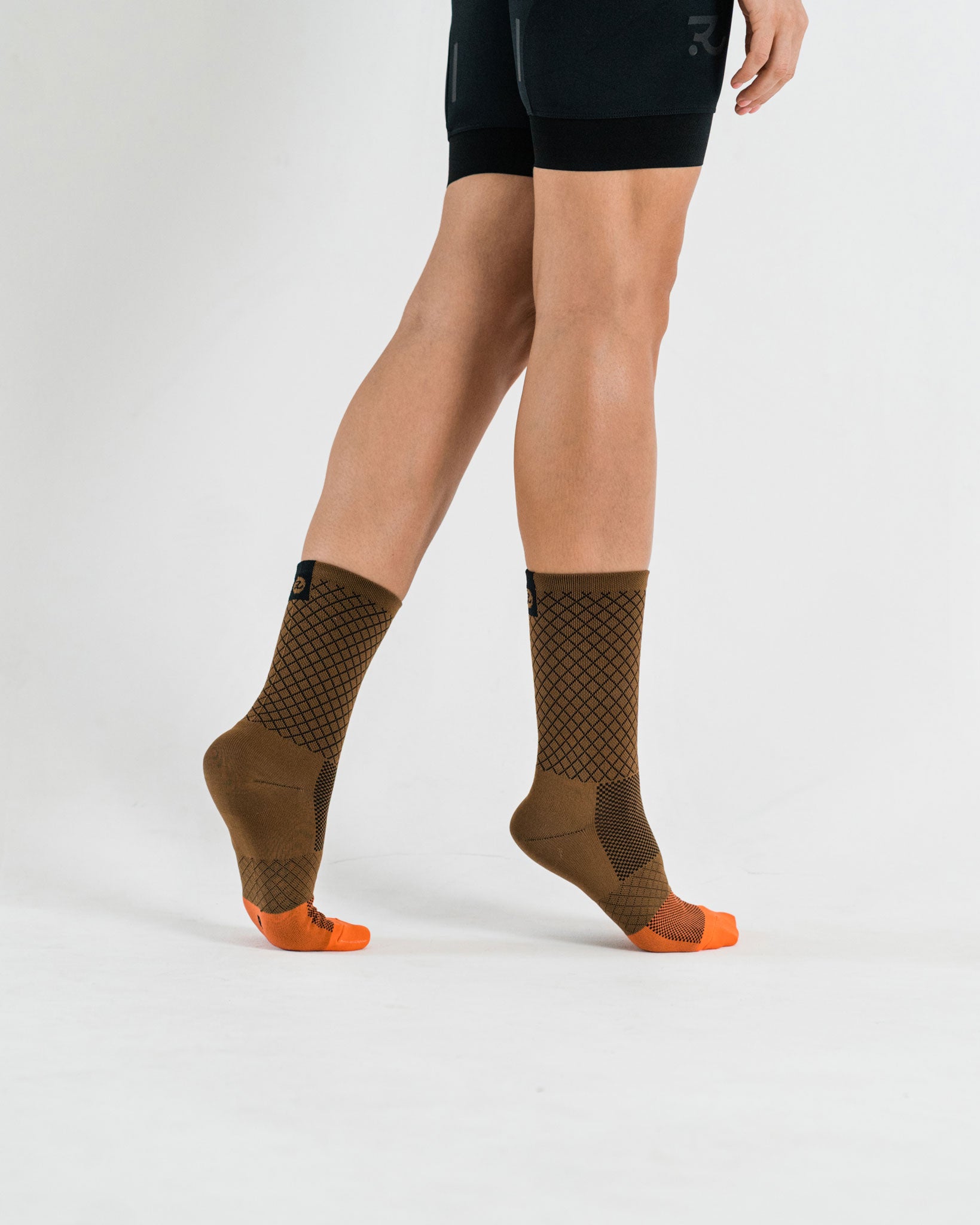 side view of brown cycling socks